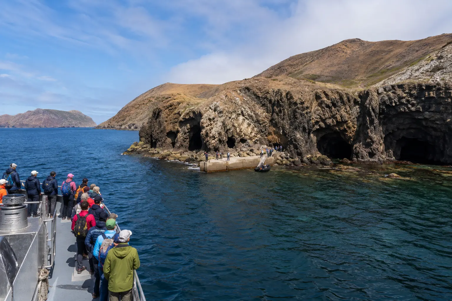 Visitors arriving by boat at a rugged Channel Islands landing