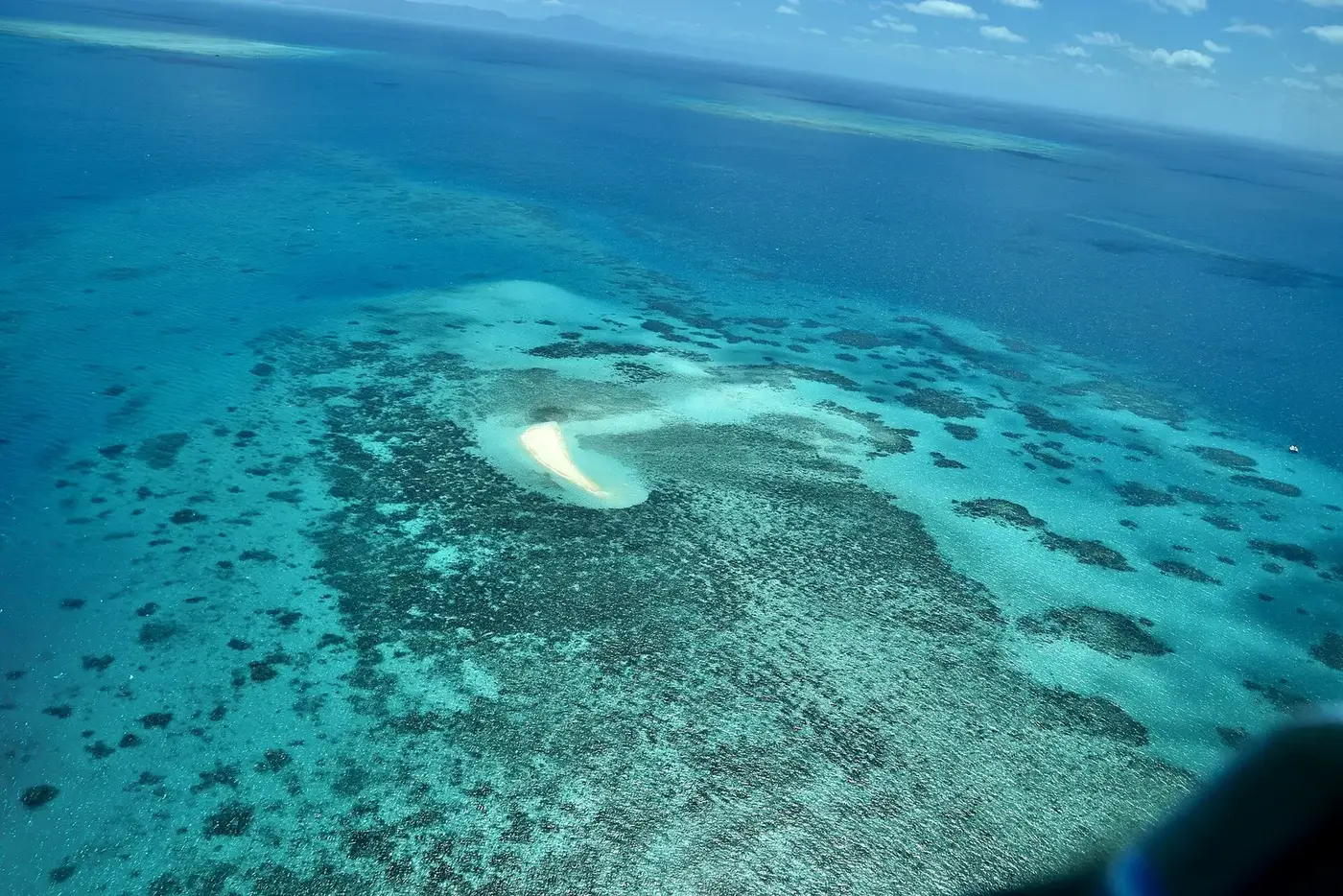 An aerial view of the Great Barrier Reef in Queensland, Australia