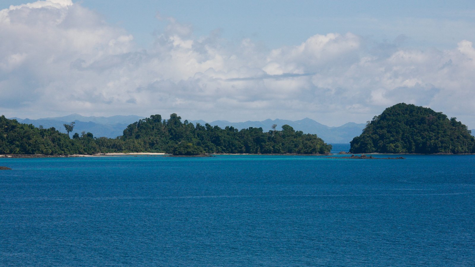 Coastal view across tropical water and forested islands in Coiba National Park, Panama