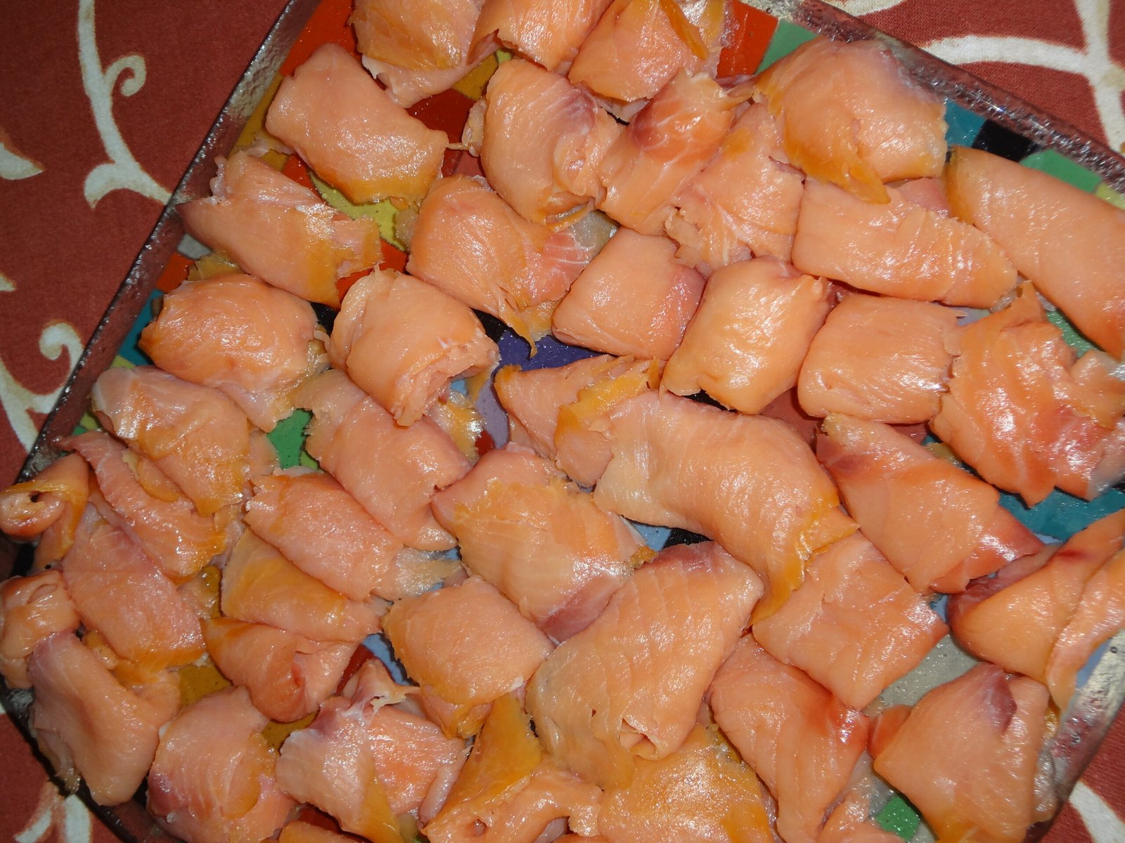 Slices of smoked salmon arranged ready to eat