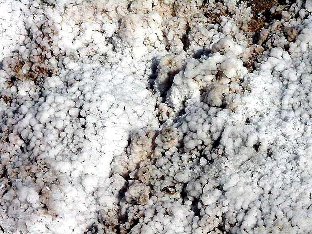 Close view of sea-salt crystals illustrating the dissolved minerals that make ocean water salty