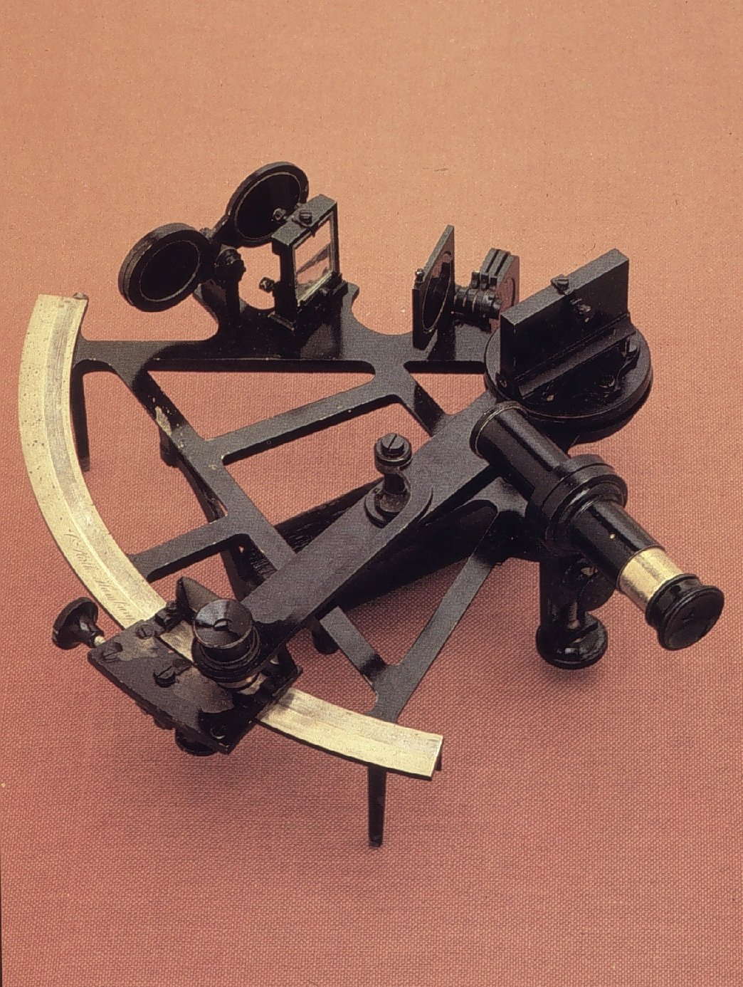 Historic black-and-brass Plath sextant with telescope and graduated arc